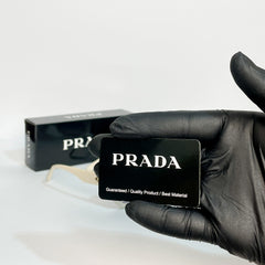Prada Soft Ivory Women’s Sunglasses
